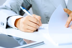 Close up image of businesswoman hands signing documents-1